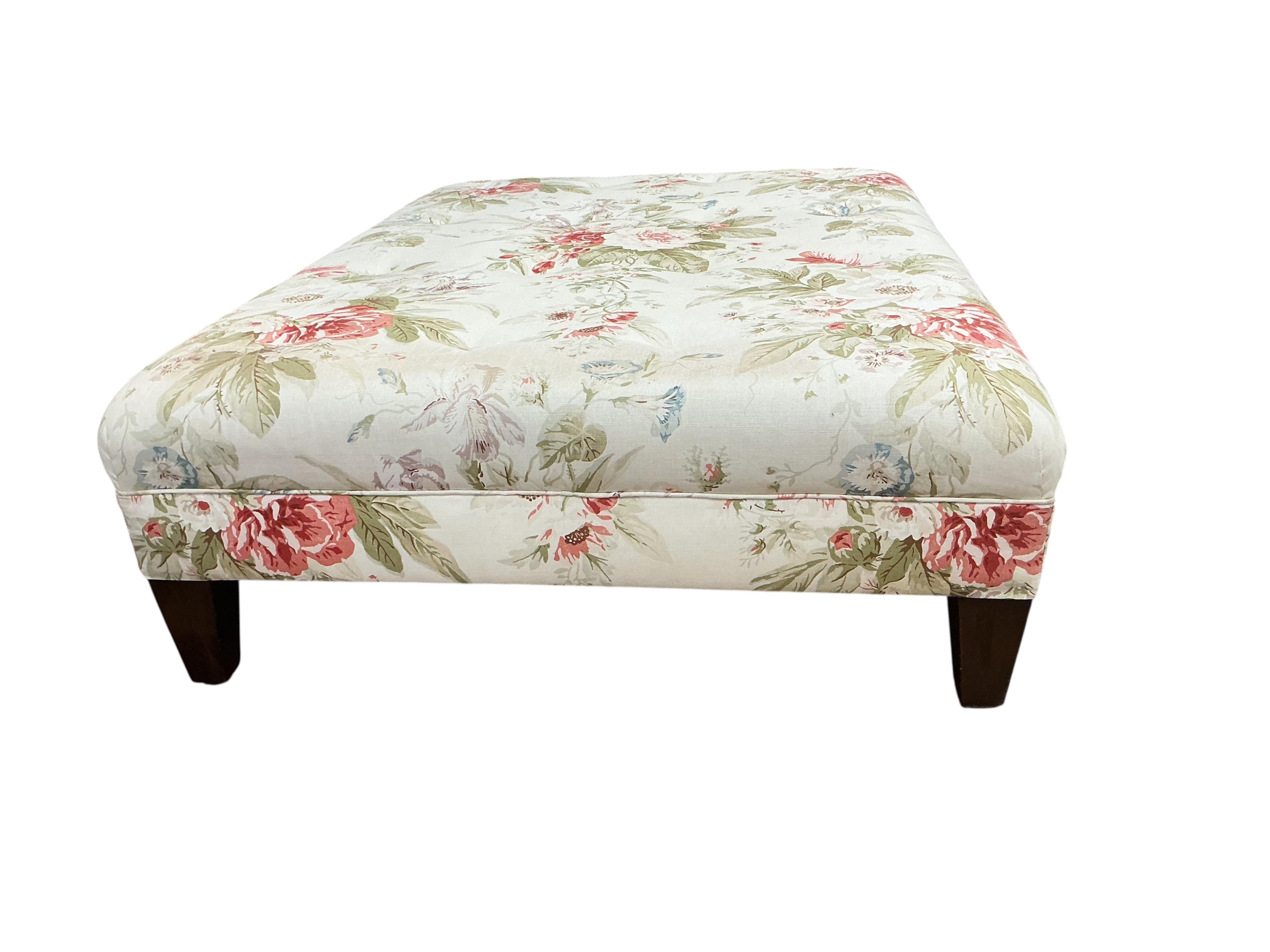 A large rectangular floral buttoned upholstered ottoman footstool, width 118cm, depth 88cm, height 35cm